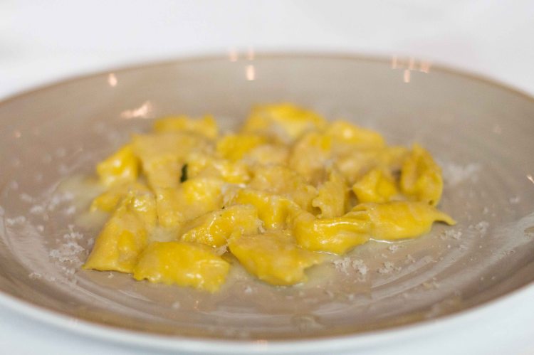 Handmade celery root agnolotti with marscapone, parmesan and brown butter sauce.